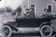 Caroline Partch Hughes with sons Walter and Almon (at wheel)